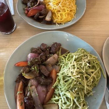 Picante - Lomo saltado with a pesto pasta. Lomo saltado with a huacaina pasta - Peruvian Near Me - Ontario, California Picante - Lomo saltado with a pesto pasta. Lomo saltado with a huacaina pasta - Peruvian Near Me - Ontario, California