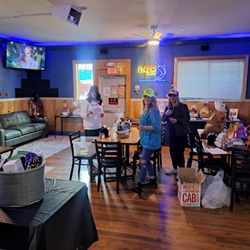 Hardtails - Our AWESOME Volunteers setting Up for Our Ronald McDonald House fundraiser event in the newly remodeled Back room.