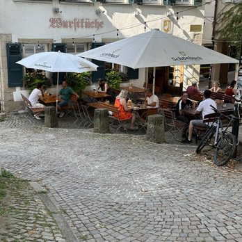 Wurstküche - Partial view of the outdoor seating. - German Near Me - Tübingen, BW Wurstküche - Partial view of the outdoor seating. - German Near Me - Tübingen, BW