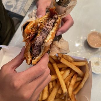 The Stand - American Classics Redefined - Onion Stack Burger and regular fry - New American Near Me - Tustin, California The Stand - American Classics Redefined - Onion Stack Burger and regular fry - New American Near Me - Tustin, California