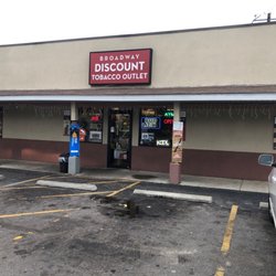 Broadway Discount Tobacco Outlet - This is the outside along with the one in liquor store  they probably own as well!