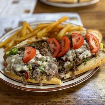 Nino's Pizza - Supreme Cheesesteak with jalapeños and fries - Pizza Near Me - Mobile, Alabama