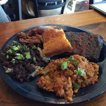 Dinosaur Bar-B-Que - Pick any two combo with ribs and brisket along with black beans and a jambalaya special side. - Barbeque Near Me - Rochester, New York Dinosaur Bar-B-Que - Pick any two combo with ribs and brisket along with black beans and a jambalaya special side. - Barbeque Near Me - Rochester, New York