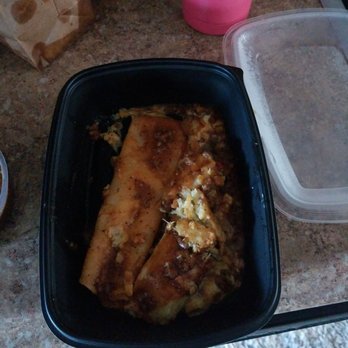 Uncle Julio's - This was my take-home box...why is the tamale in 2 pieces and where's the cheese and sauce on the enchilada? - Mexican Near Me - Gaithersburg, Maryland Uncle Julio's - This was my take-home box...why is the tamale in 2 pieces and where's the cheese and sauce on the enchilada? - Mexican Near Me - Gaithersburg, Maryland