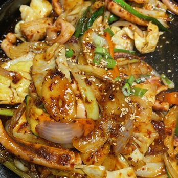 Agit - Osam Stir-Fired Spicy Squid and Pork Belly was good! Savory, not too spicy, with chewy coins of rice cake - Korean Near Me - Federal Way, Washington Agit - Osam Stir-Fired Spicy Squid and Pork Belly was good! Savory, not too spicy, with chewy coins of rice cake - Korean Near Me - Federal Way, Washington