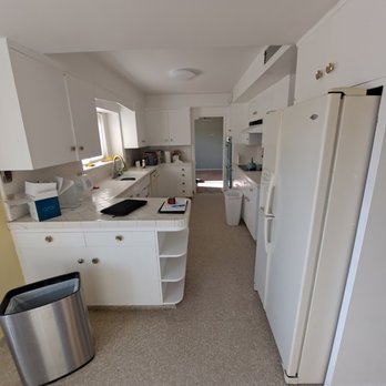IP Universal Construction - a kitchen with white cabinets and appliances - Painters Near Me IP Universal Construction - a kitchen with white cabinets and appliances - Painters Near Me