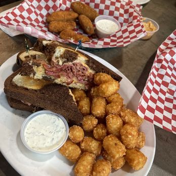 Berkeley's Bar & Grill - Reuben with tots and jalapeño poppers - Bars Near Me - Lake Oswego, Oregon Berkeley's Bar & Grill - Reuben with tots and jalapeño poppers - Bars Near Me - Lake Oswego, Oregon