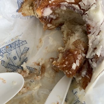 Windmill Restaurant - 70% eaten fried cinnamon roll (a little cold as you can see by the frosting) - Breakfast & Brunch Near Me - Holland, Michigan Windmill Restaurant - 70% eaten fried cinnamon roll (a little cold as you can see by the frosting) - Breakfast & Brunch Near Me - Holland, Michigan