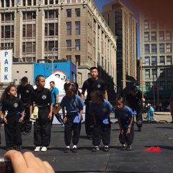 Calvin Chin's Martial Arts Academy - Youth performers on stage at August Moon festival in Boston's Chinatown