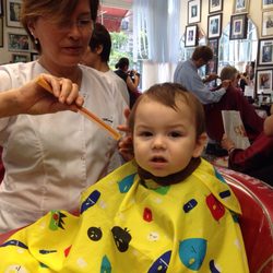 Diego’s Hair Salon - The boy gets a haircut from Mary at Diego's.