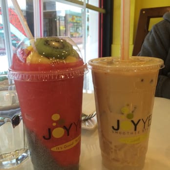Joy Yee Noodle - Strawberry smoothie with basil seeds and fruit on top and a mango milk tea with lychee jelly - Chinese Near Me - Chicago, Illinois