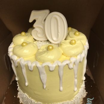 Isabella's Cupcakes & More - This was a cake we got for my son's 30th. Lemon specialty. Today we got a salted caramel for his 36. - Cupcakes Near Me - Riverside, California Isabella's Cupcakes & More - This was a cake we got for my son's 30th. Lemon specialty. Today we got a salted caramel for his 36. - Cupcakes Near Me - Riverside, California