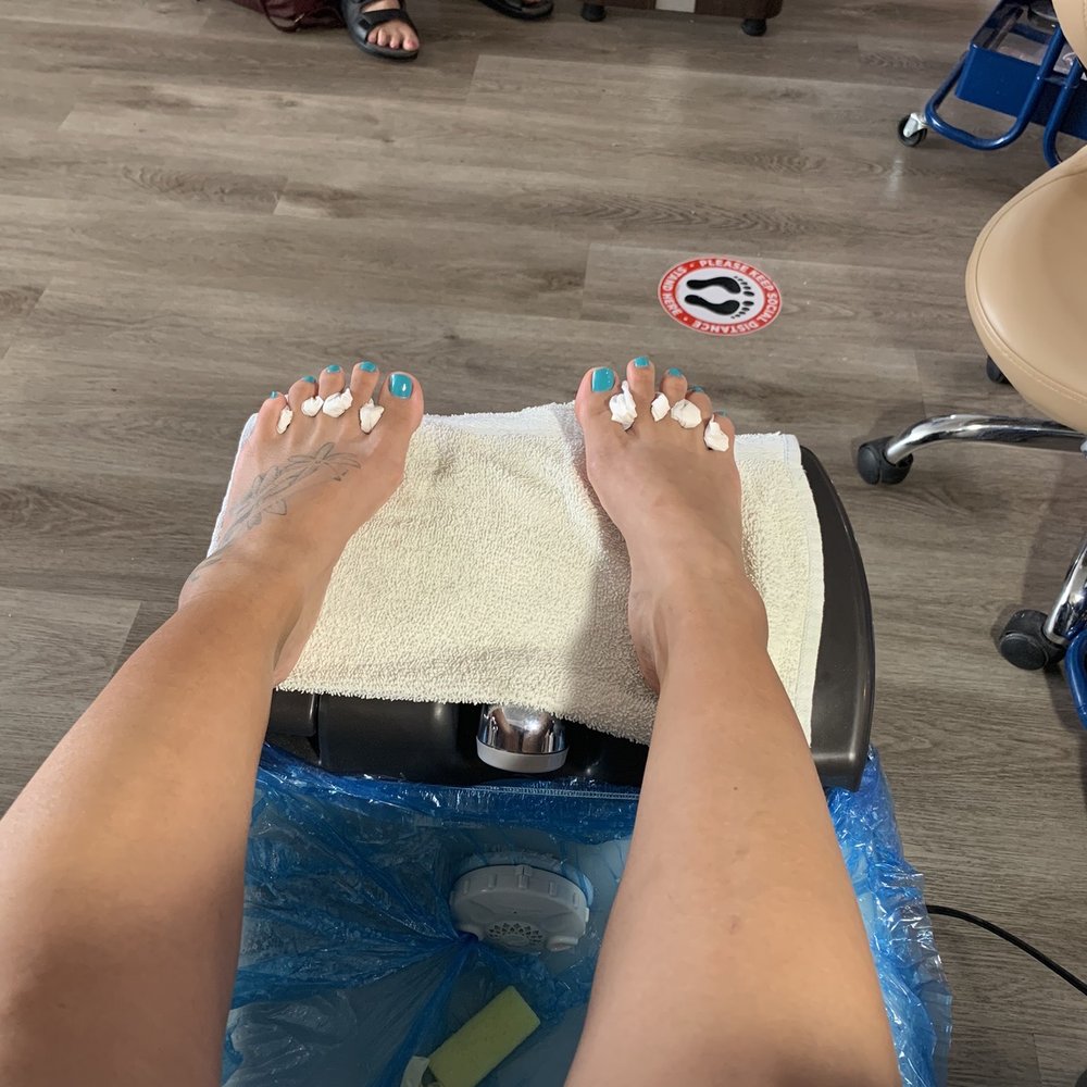 Nail'd It! Spa - Im chair see the social distance stickers marked in the floor - Nail Salons Near Me - Stanton, California