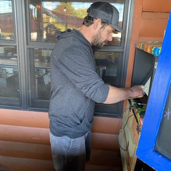 The Pickled Wrinkle - The owner doing important owner stuff... Nice guy. - Pubs Near Me - Birch Harbor, Maine