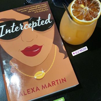 Old Major - Check this book out if you have a chance and the rum punch!!! - Cocktail Bars Near Me - Baltimore, Maryland