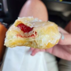 Sunny Donuts - Raspberry filled glaze. Yummy!