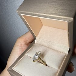 Queens Jewelers - Marquise diamond engagement ring with hand engraved gold band, on a cathedral setting