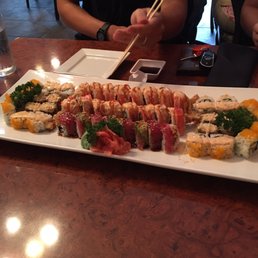 California rolls surround the crunchy roll on the ends the middle is two Detroit rolls and the Tokyo roll. California rolls surround the crunchy roll on the ends the middle is two Detroit rolls and the Tokyo roll.