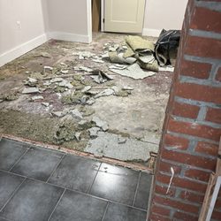 Unique Hardwood Flooring - This was after he pulled his work up. Then he lifted the carpet lining
