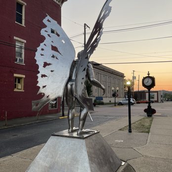 Mothman Statue - Mothman at sunset - Landmarks & Historical Buildings Near Me - Point Pleasant, West Virginia Mothman Statue - Mothman at sunset - Landmarks & Historical Buildings Near Me - Point Pleasant, West Virginia