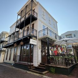 Arepas Coffee & Bar - Outdoor seating in a shaded alleyway off the main Beacon path