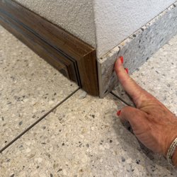 Carpet Barn - Porcelain Tile Install with  Transition to Wood on Trim