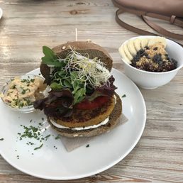 Chickpea and quinoa burger and baby runner açaí bowl Chickpea and quinoa burger and baby runner açaí bowl