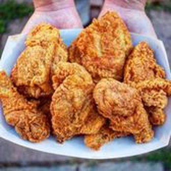 Krispy Krunchy Chicken - a person holding a bowl of fried chicken - Seafood Near Me - Mesa, Arizona Krispy Krunchy Chicken - a person holding a bowl of fried chicken - Seafood Near Me - Mesa, Arizona