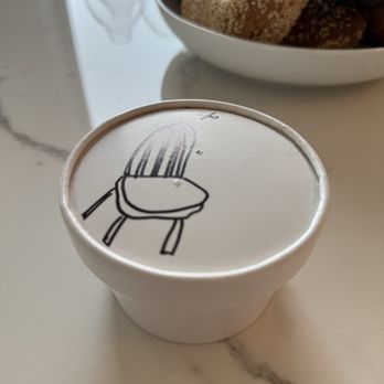 Mt. Bagel - Cover of cream cheese. - Bagels Near Me - Seattle, Washington