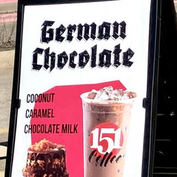 a sign for a coffee shop