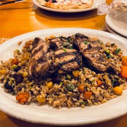 a plate of chicken and rice