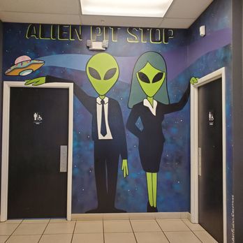 Cosmic Donuts - Cute restroom signage - Donuts Near Me - Palm Harbor, Florida