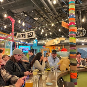 Trail Break - a group of people sitting at a bar - Tacos Near Me - Hartford, Vermont