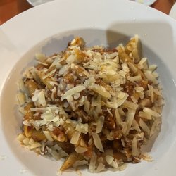 Gastronomia Italiana - Spinach tortellini and pasta Bolognese