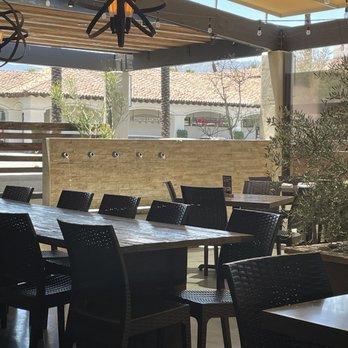 Eureka! - Patio with water feature...nice and cool with the fans - American Near Me - Indian Wells, California Eureka! - Patio with water feature...nice and cool with the fans - American Near Me - Indian Wells, California
