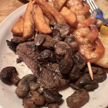 Texas Roadhouse - Steak with sautéed mushrooms with grilled shrimp and a side of fries. - Barbeque Near Me - Tracy, California Texas Roadhouse - Steak with sautéed mushrooms with grilled shrimp and a side of fries. - Barbeque Near Me - Tracy, California
