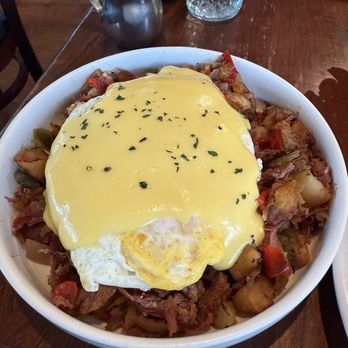 Petit Soleil - Corned beef hash and eggs with Hollandaise - Breakfast & Brunch Near Me - Napa, California Petit Soleil - Corned beef hash and eggs with Hollandaise - Breakfast & Brunch Near Me - Napa, California