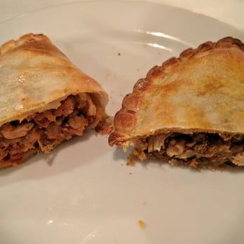Buenos Aires Grill - Mmm, the empanadas are so easy to eat. The pastry is thin and crisp, and you get lots of tasty filling. (Chicken and beef empanada). - Argentine Near Me - Northridge, California