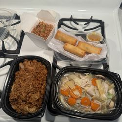Mai Mai Asian Cuisine - Chicken chop suey with fried rice, Thai pineapple fried rice, and spring rolls.