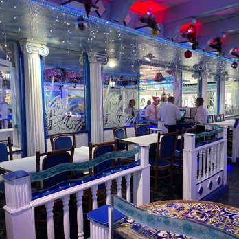 Hellas Restaurant - And area to walk through the restaurant and seating area for customers. - Bakeries Near Me - Tarpon Springs, Florida