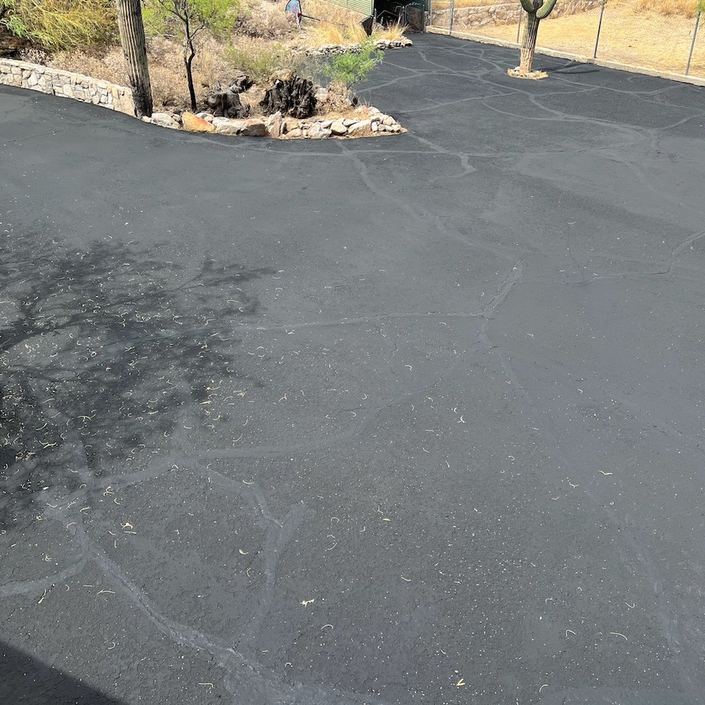 A few days after the job. This is really old asphalt A few days after the job. This is really old asphalt