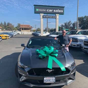Enterprise Car Sales - Me and my 2018 Mustang GT convertible. Kevin found it for me and made it easy for me to buy. I am stoked! - Car Dealers Near Me - Vista, California Enterprise Car Sales - Me and my 2018 Mustang GT convertible. Kevin found it for me and made it easy for me to buy. I am stoked! - Car Dealers Near Me - Vista, California