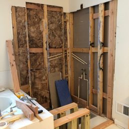 Had to remove tile shower walls to fix shower head leak originating behind the wall