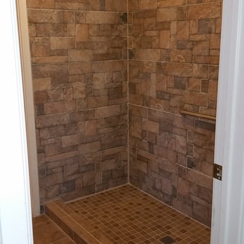 TGCI Construction - a bathroom with a shower - General Contractors Near Me TGCI Construction - a bathroom with a shower - General Contractors Near Me