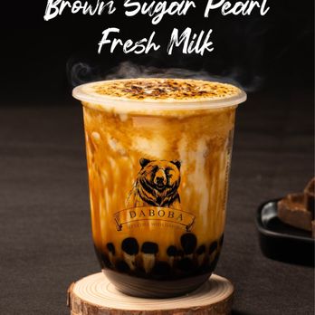 Daboba - a cup of iced coffee on a wooden coaster - Bubble Tea Near Me - Chicago, Illinois Daboba - a cup of iced coffee on a wooden coaster - Bubble Tea Near Me - Chicago, Illinois