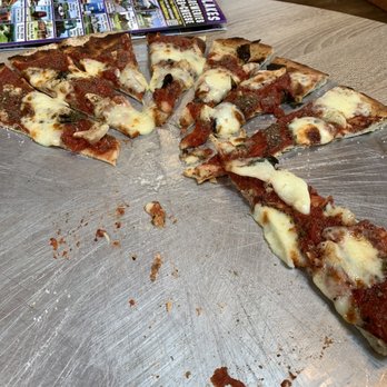 Silver Springs Winery - Working on the pizza. Not a crumb was left after we were done. So yummy. - Wineries Near Me - Burdett, New York Silver Springs Winery - Working on the pizza. Not a crumb was left after we were done. So yummy. - Wineries Near Me - Burdett, New York