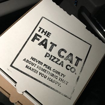 Fat Cat Pizza - a person holding a box of pizza - Pizza Near Me - Strafford, Missouri