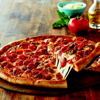 Marco's Pizza - a pepperoni pizza on a cutting board - Chicken Wings Near Me - Clovis, California