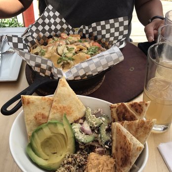 Bear Street Tavern - Mediterranean bowl/ pulled pork nachos / elderflower ginger kombucha - Pizza Near Me - Banff, Alberta