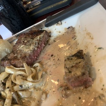 Bella Sera - a plate of food with pasta and meat - Italian Near Me - Denison, Iowa